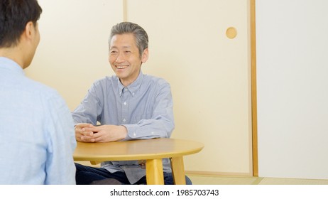 Asian Senior Man At Home