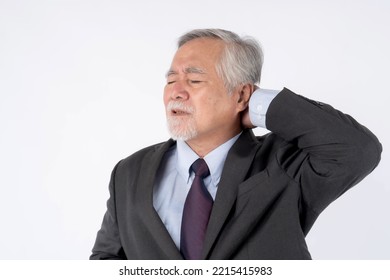 Asian Senior Man , Old Man With Suit , He Had Pain In The Nape Of His Neck Caused By Sleeping On A Pillow That Is Not Correct Posture - Senior People