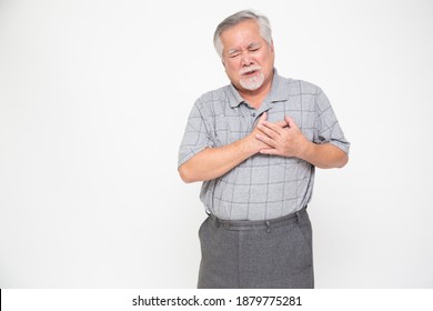 Asian Senior Man With Pain On Heart Isolated On White Background, Health Problem And Feeling Sick Concept