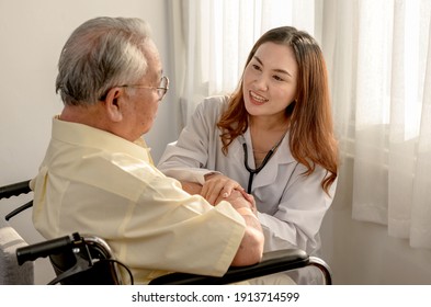 Asian Senior Man Was Sick And Sitting On Wheelchair. The Doctor Check Retirement Age Health At Home.