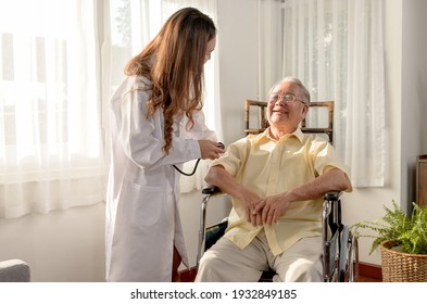 Asian Senior man was sick and sitting on wheelchair. The doctor check retirement age health at home. - Powered by Shutterstock