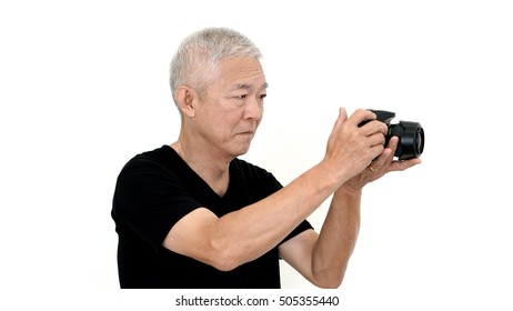 Asian Senior Man Start On Photography As Hobby On Free Time White Isolate Background