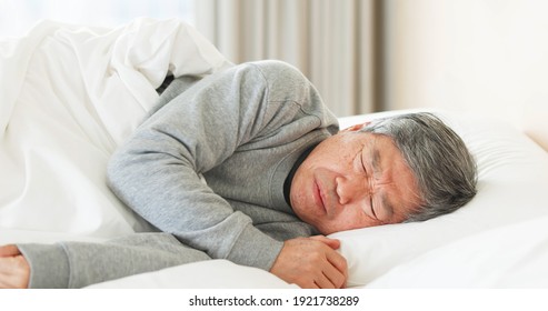 Asian Senior Man Suffered From Insomnia In Bedroom At Home