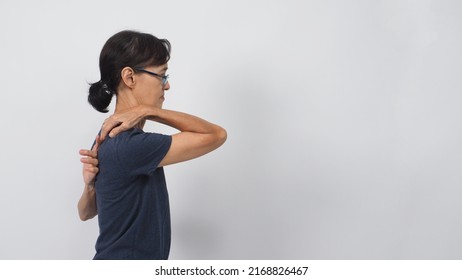 Asian Senior Or Older Woman Had Touch A Back Posture On White Background. Side View