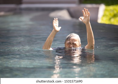 Asian Senior People Struggling Underwater, Hand Peeking Out Of The Water, Female Drowned In Swimming Pool, Drowning Elderly Woman In Swimming Pool Asking For Help In Dangerous Situation