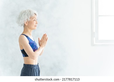 Asian Senior Woman Doing Yoga