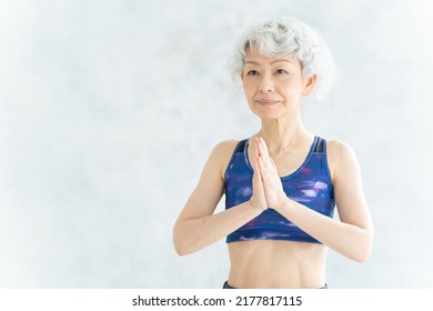 Asian Senior Woman Doing Yoga