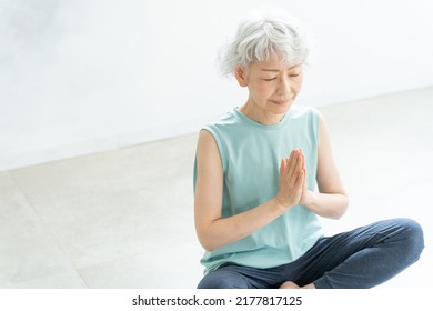 Asian Senior Woman Doing Yoga