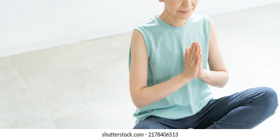 Asian Senior Woman Doing Yoga