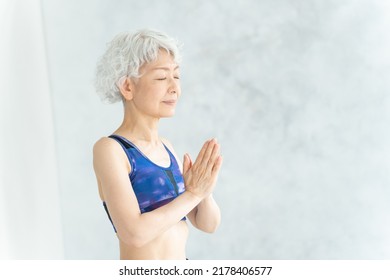 Asian Senior Woman Doing Yoga