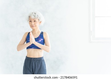 Asian Senior Woman Doing Yoga