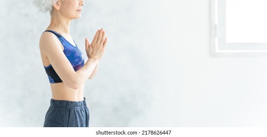 Asian Senior Woman Doing Yoga