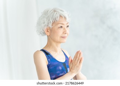 Asian Senior Woman Doing Yoga