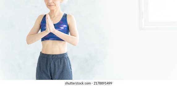 Asian Senior Woman Doing Yoga