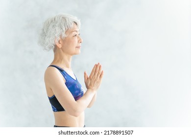 Asian Senior Woman Doing Yoga