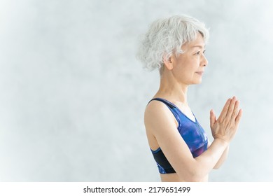 Asian Senior Woman Doing Yoga