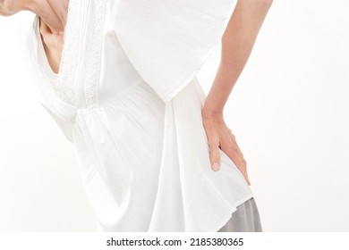 Asian Senior Woman Having  A Backache In White Background, No Face