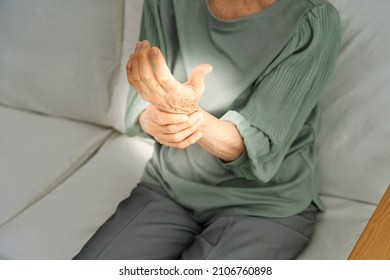 Asian Senior Woman Having The Joint Pain, No Face