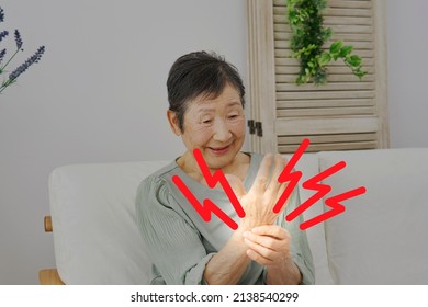 Asian Senior Woman Having The Joint Pain, No Face