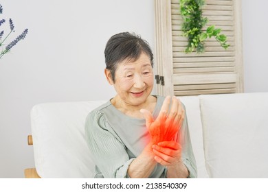 Asian Senior Woman Having The Joint Pain, No Face