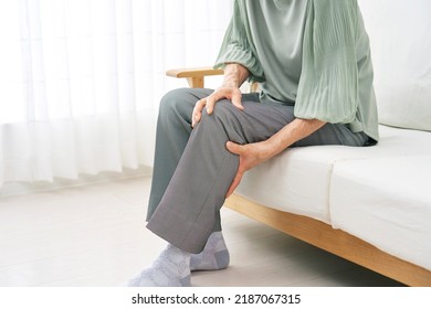 Asian Senior Woman  Having The Joint Pain At Home, No Face