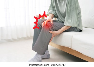 Asian Senior Woman  Having The Joint Pain At Home, No Face