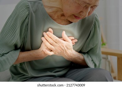 Asian Senior Woman Having A Palpitation Of The Heart