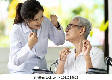 Asian Senior Woman Listen,study How To Use Dental Floss With Professional Female Dentist,service Or Educate About Oral Health Care,gums Treat,teach Teeth Cleaning Hygiene While Visiting A Nursing Home