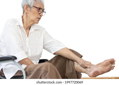 Asian Senior Woman Massaging Ankle And Feet,old Elderly Had Beriberi,cramp,numbness In Her Feet,sore Toe Joints,peripheral Neuropathy Disease,pain And Swelling In The Ankle Bone,leg Muscle Weakness