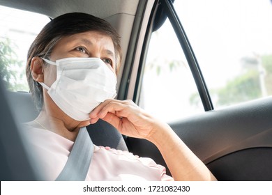 Asian Senior Woman Passenger Wear Surgical Mask For Prevent And Protection Coronavirus Or Covid-19 While Sitting In Car. Public Transportation. Sanitation, Healthy, Pandemic Virus.