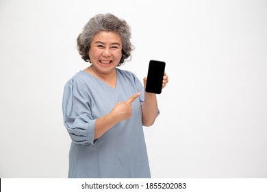 Asian Senior Woman Showing Or Presenting Mobile Phone Application On Hand Isolated On White Background