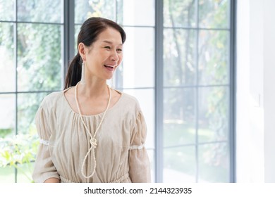 Asian Senior Women Dressing Up