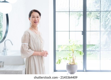 Asian Senior Women Dressing Up