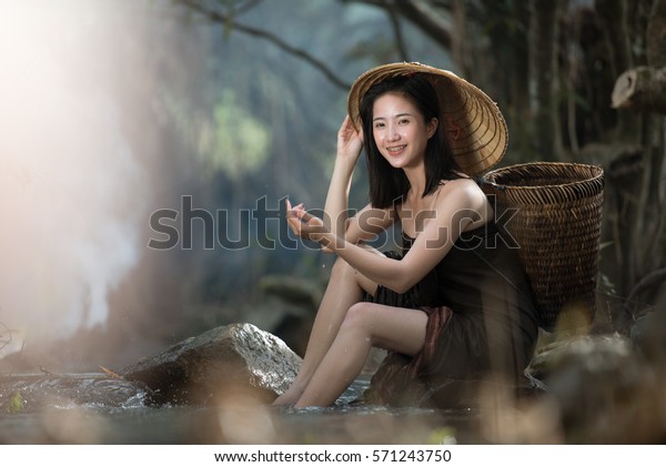 Asian Woman Bathing In A Stream Stock Image - Image of 