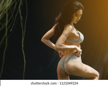 hanging by her breast Hanging by her breast