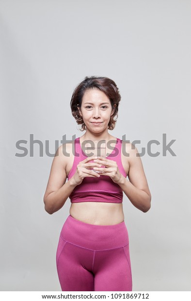 Asian Short Hair Woman Holding Glass Sports Recreation Stock Image