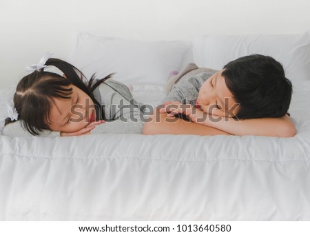 Asian Sister Sleeping With His Brother In White Bedroom Concept Of Happy Family Asian Sister Sleeping With His Brother In White Bedroom Concept Of Happy Family