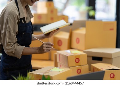 Asian small business owner working at home office. Business retail market and online sell marketing delivery, SME e-commerce concept. - Shutterstock ID 2168444457