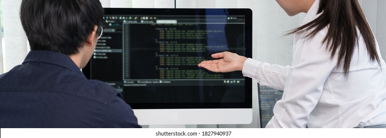 Asian Software engineer Programmer team working together on project of the System Coding New Application In IT Company Office.