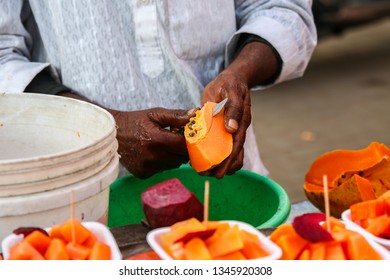 Asian Street Man Cutting Fresh Healthy Papaya Making Mix Fruit Chaat Stall In Market - Image