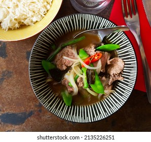 Asian streetfood cuisine beef soup with basil in Thailand