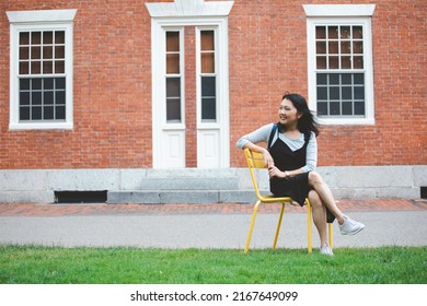 Asian Students In Campus Of The University In Cambridge, Massachusetts, USA 