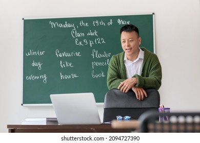 Asian Teacher Conducting English Lesson Online