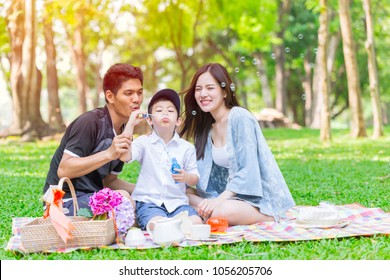 Asian Teen Family Happy Holiday Picnic Moment In The Park