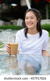 Asian Teenager Woman Drinking Ice Coffee