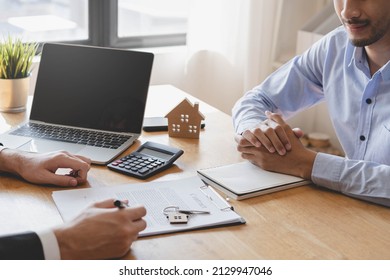 Asian tenant, client man sign signature contract rental purchase, buyer home or apartment with landlord, realtor after banker agreement mortgage, loan success or done. Property lease agent concept. - Shutterstock ID 2129947046