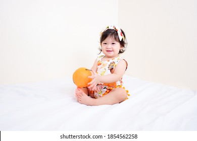 Asian Thai Cute Baby Girl in Thanksgiving Costume, Thanksgiving Day