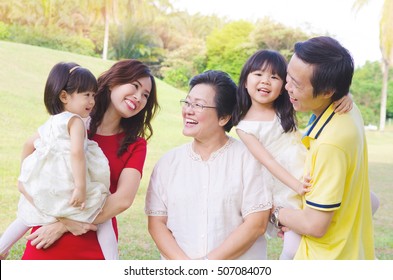 Asian Three Generations Family Enjoying Outdoor Nature