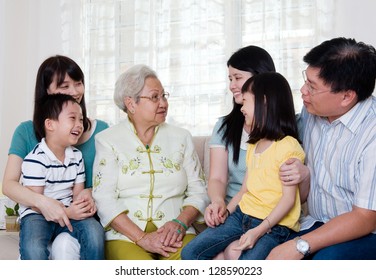 Asian Three Generations Family Having Conversation