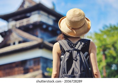 Asian tourists and Japanese castle